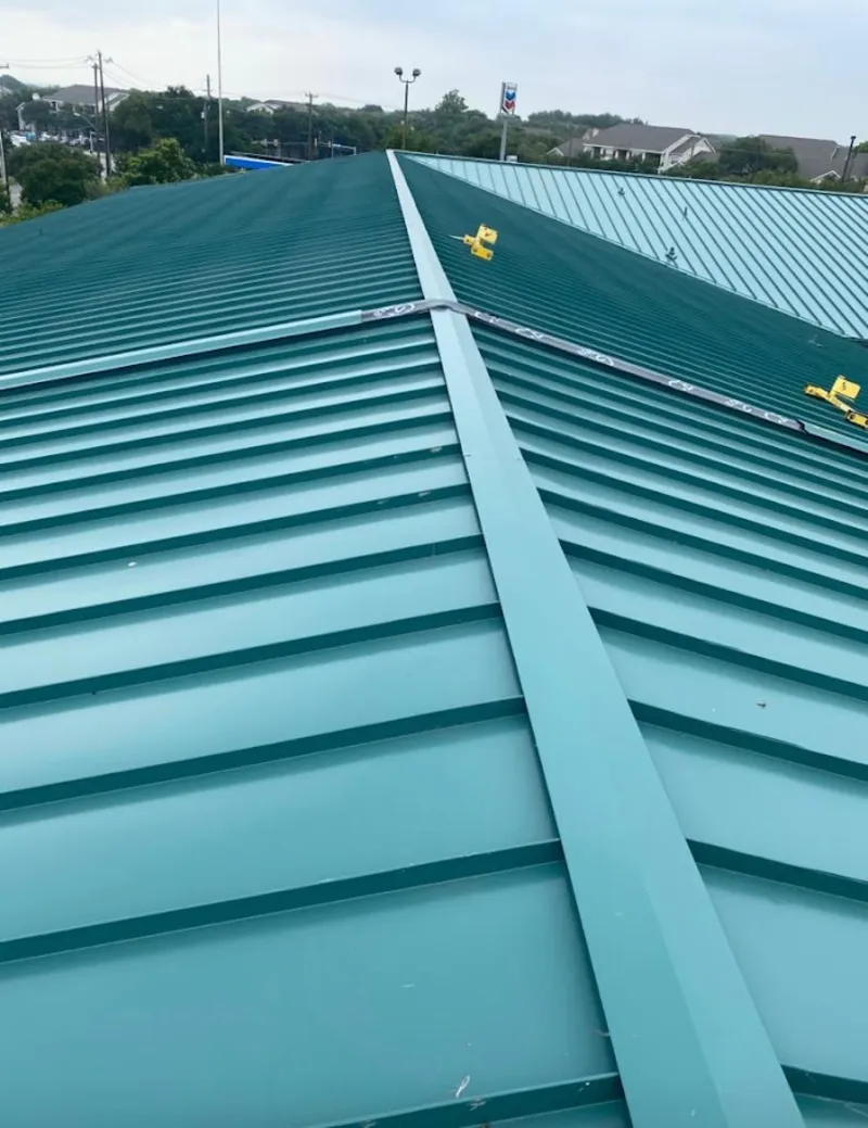 Green commercial metal roof ridge and valley for Metal Roof Repair in Pewaukee